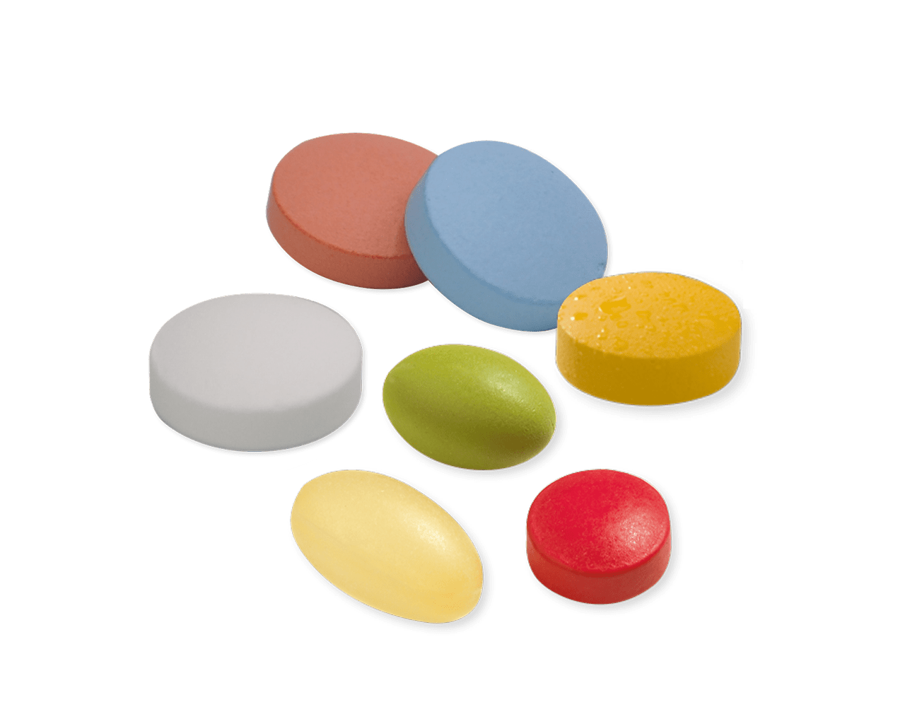 Assortment of coated tablets in various shapes and sizes